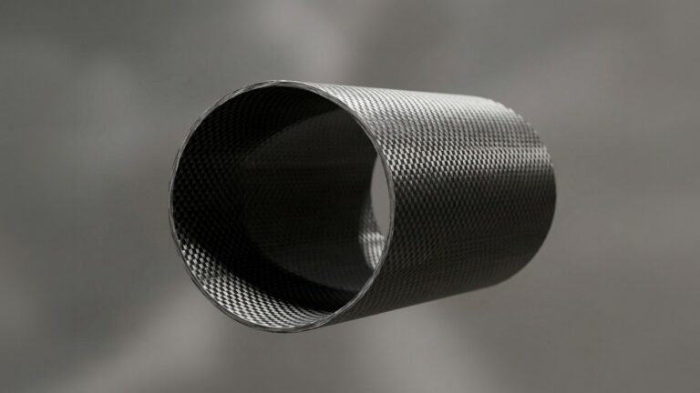 Close-up of a carbon fiber tubes with grid pattern