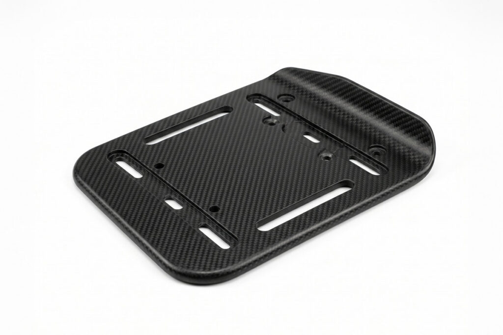 Carbon fiber wheelchair footrest
